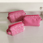 Set de necessaires na cor pink com estampado floral e riscas em branco.Três diferentes tamanhos, pequeno, médio e grande.