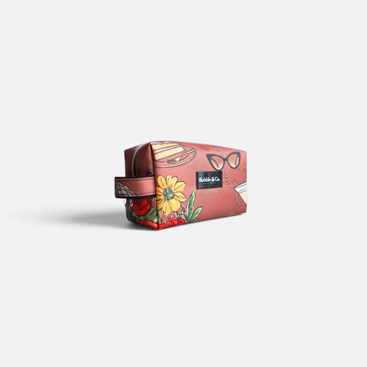 Close-up of the exclusive Her Little World print on Bubble & Co. M toiletry bag