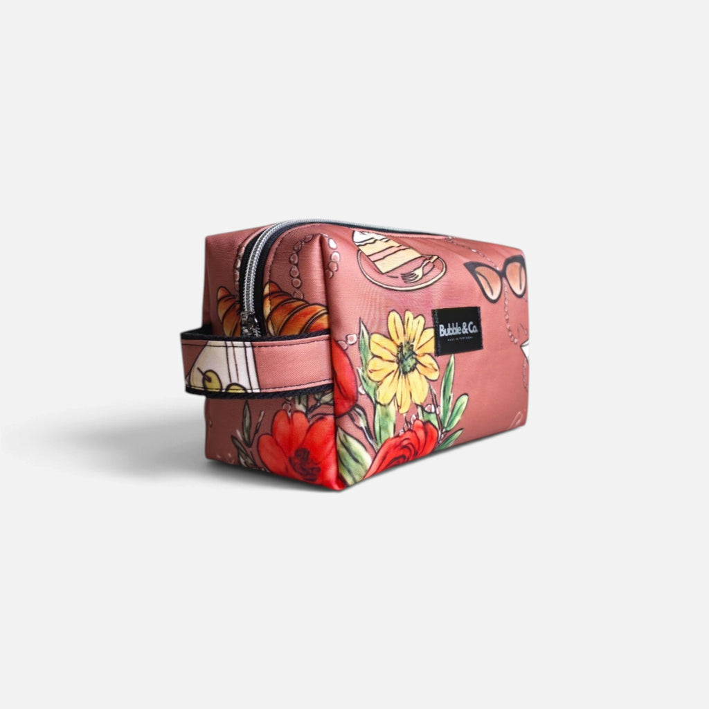 Her Little World print detail on Bubble & Co. L toiletry bag