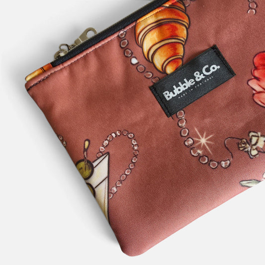 Close-up of the exclusive Her Little World print on Bubble & Co. Pouch Bag