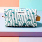 Necessaire Box, impermeável com padrão zebra pintas verdes e brancas